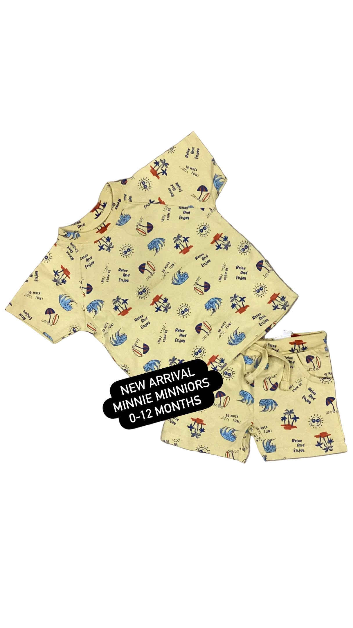 Baby outfit with cartoon design on a textured gray surface