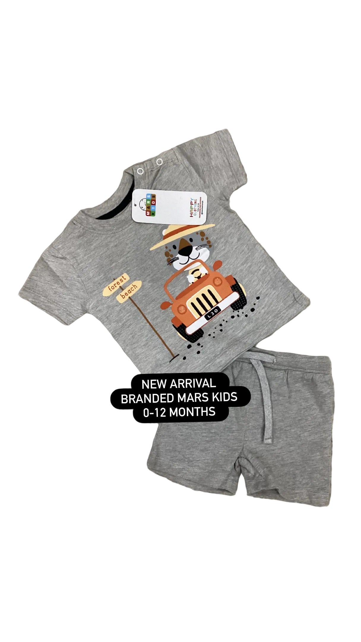 Gray children's t-shirt with cartoon truck design on a fluffy white surface, featuring 'BRANDED MARS KIDS' branding.