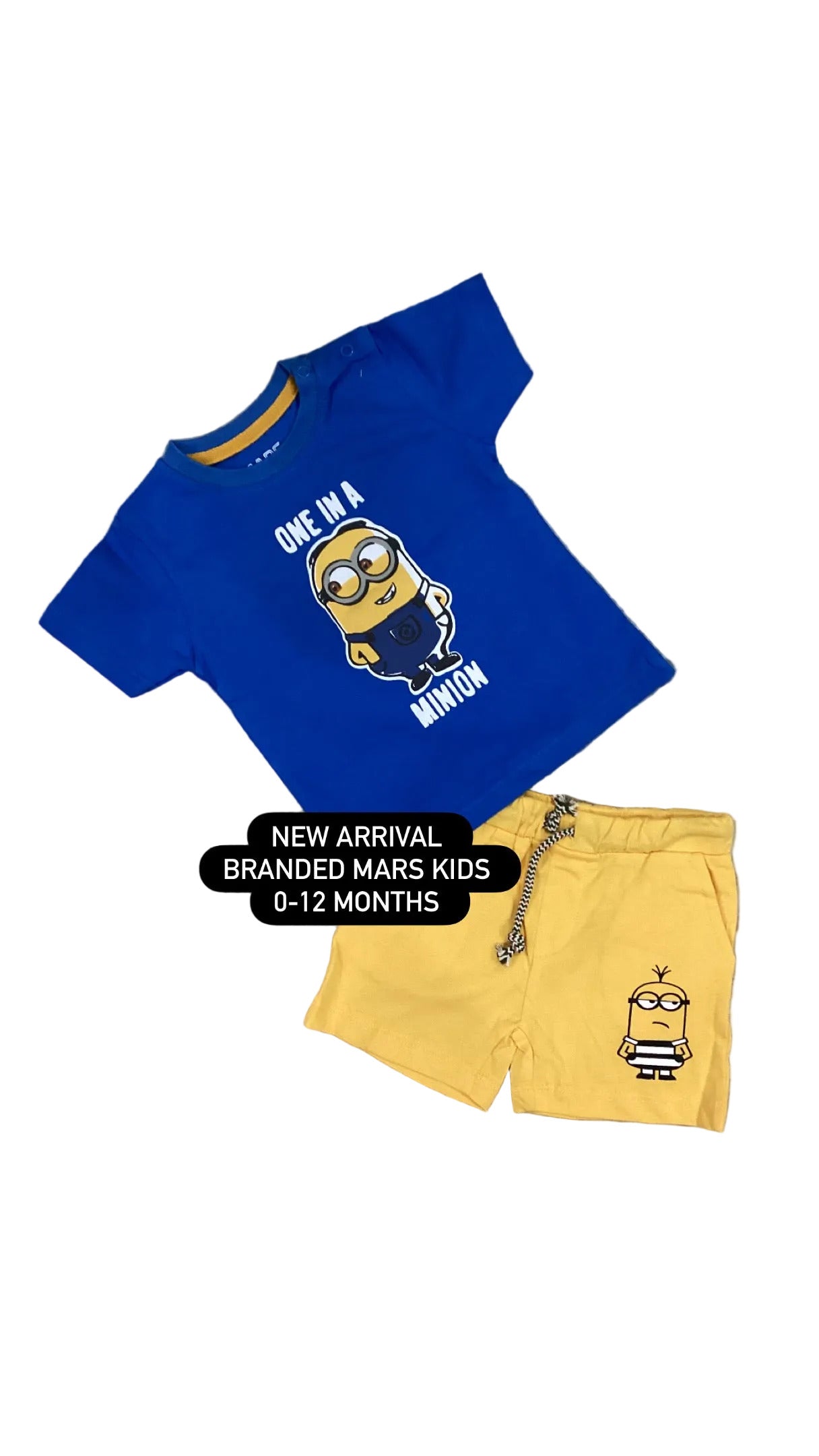 Children's blue shirt and yellow shorts set with a Minions design on a textured surface.