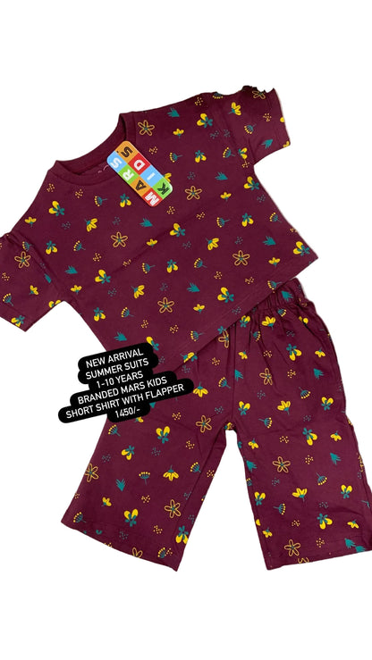 Maroon children's set with colorful patterns on a white surface