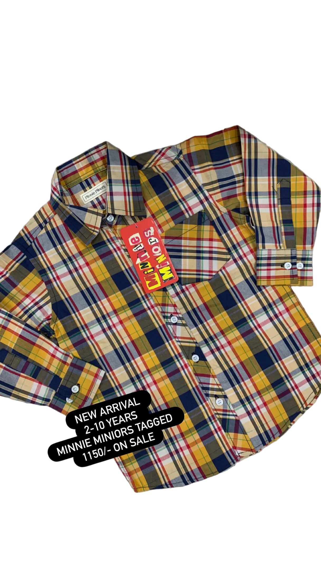 Plaid shirt with a tag on a textured surface